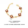Popular en Xiaohongshu: Lujoso juego de collar, aretes y pulsera con forma de trébol incrustado de diamantes, chapado en oro, para mujer, con un toque de alta gama