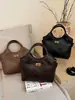 Bolso Cubo Retro Shuai Mi Jia para Mujer 2026 Nuevo Bolso de Mano con Patrón de Diamantes Moda de Nicho Bolso de Hombro Único Cruzado