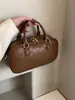 Bolso boliche portátil Corea del Sur otoño e invierno para mujer 2023 nuevo moderno retro bolso cuadrado pequeño bandolera de hombro versátil
