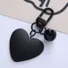 Nuevo llavero de color caramelo con forma de campana de amor, lindo para chica, corazón de chica, corazón de melocotón, funda para auriculares, colgante para bolso, en stock, venta al por mayor