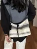 Bolso de mujer de alta gama transfronterizo, nuevo modelo verano 2026, bolsa de tela versátil casual de gran capacidad, bolso tipo cubo de un solo hombro cruzado