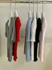 Camisa de Punto Henley de Canalé Vertical Minimalista Estilo Coreano de Verano Ajustada de Tacto Frío para Mujer W10220
