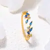 Anillo de espiga de trigo con incrustaciones de diamantes de colores transfronterizo europeo y americano para mujer, microincrustado, lujo ligero, anillo de hoja de nicho de alta gama, anillo ajustable