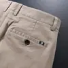 Chegada Nova Primavera 2025 Calças Casuais Retas Slim Fit de Alta Elasticidade Confortáveis com Textura Fina Resistentes a Amassados Sem Passar para Homens