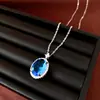Conjunto de brincos, colar e anel de zircônia oval com agulha de prata transfronteiriço, joias de luxo leve de alta qualidade com um toque requintado e elegante
