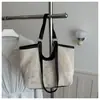 Moda tejida, elegante, moderna, bolsa de playa de paja de gran capacidad para el verano 2026, ligera y fácil de transportar