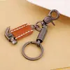 Llavero de cuero de vaca elegante europeo y americano colgante de llave de joyería punk vintage joyería de productos pequeños de Yiwu venta al por mayor