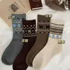 Calcetines nuevos de otoño e invierno de estilo étnico retro Fair Isle para mujer, calcetines hasta media pantorrilla estilo ins, versátiles y modernos, calcetines por encima de la rodilla