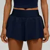 Shorts esportivos de corrida europeus e americanos transfronteiriços de toque frio e secagem rápida, verão fino duas peças anti-exposição fitness elástico calça de yoga