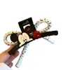 Estilo Dongdaemun Clip de Garra Grande de Perla de Dibujos Animados Mickey por Ambos Lados Lindo Clip de Tiburón de Lunares Accesorio para el Cabello de Alta Gama