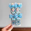 Nuevo set de accesorios para el cabello de princesa de hielo azul con alas de ángel, moño, pinza BB y combinación de banda elástica para niñas