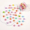 Al por mayor versión coreana de color caramelo dibujos animados clip flor pequeña estrella de cinco puntas pasador de princesa pinza de garra pasador femenino joya en caja