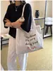 Nova Bolsa de Ombro Casual de Grande Capacidade 2026 para Mulheres, Bolsa Tote de Lona Versátil Estilo Coreano para Trabalho e Deslocamento