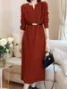 Vestido de tricô elegante com decote em V e cinto para mulheres, novo vestido longo de outono e inverno acima do joelho, modelagem solta, que valoriza a silhueta, vestido base de suéter