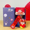 2025 Año de la Serpiente Tendencia Nacional Creativo Pequeña Serpiente de la Suerte Llavero Caja de Regalo Lindo Bolso Llavero Colgante Venta al por Mayor Pequeños Regalos