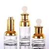 Frasco de vidro transparente personalizado para óleo essencial frasco de cosméticos frasco de vidro vazio frasco conta-gotas frasco de emulsão pode ser personalizado