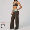 En StockNuevo Modelo 2026 Hermosa Espalda Conjunto de Dos Piezas Falsas de Lunares y Rayas Pantalones de Yoga Casual de Moda Cintura Plegada