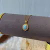 Novo Conjunto de Colar com Pingente de Pedra do Mar Vintage para Mulheres, Nicho de Luxo Leve, Corrente para Clavícula Azul, Anel e Brincos