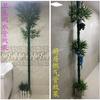 Planta de ratán con flores artificiales de bambú, bolsa de corteza de plástico, tubo de calefacción, protección de gas, pilar, tubería de alcantarillado, decoración