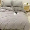 Jie Liya Algodón Puro Hilo 40S Teñido en Hilo Algodón Lavado Rayas Borde de Concha Estilo Japonés Juego de Cama de Cuatro Piezas Funda de Edredón Individual Disponible para Mayorista