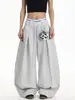 Calça de moletom desconstruída, plissada, com estampa de letras e perna curva, estilo americano, para homens e mulheres, com caimento fluido, adequada para dançar, uso casual e esportes