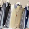 Look estiloso de duas peças transfronteiriço 2026 novo design feminino de camisa listrada de malha emendada estilo francês camisa básica de manga longa