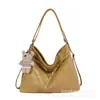 Bolsa Tote Grande Capacidade Design de Nicho Moderno Outono/Inverno 2026 Nova Bolsa de Ombro Única Feminina Elegante Cor Sólida Texturizada