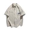 Comércio Exterior Transfronteiriço 2024 Primavera e Verão Camisa de manga curta estampada Camisa Masculina Estilo Universitário Folgada para Estudantes