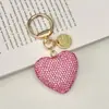 Llavero Colgante de Cerámica Arcilla Pedrería Llavero de Coche Personalidad Creativa Lujo Ligero Totalmente Cubierto de Pedrería Corazón de Melocotón Colgante para Bolso
