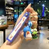 Lindo llavero de Sanrio con colgante de muñeco de dibujos animados para coche, accesorios para bolso, adornos colgantes, pequeño regalo al por mayor