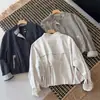 Moda coreana 2026, Chaqueta corta de moda con cuello alto para mujer, Corte holgado, Adelgazante, Top versátil, Estilo único de ropa de trabajo para mujer