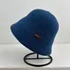 Sombrero de pescador liso versátil estilo japonés, adecuado para cabezas grandes, hace que la cara se vea más pequeña, sombrero de cubo cálido y protector de orejas, sombrero casual versátil estilo coreano