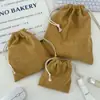 Bolsa de almacenamiento de pana de color liso con cierre de cordón, un juego portátil de tres piezas de gran capacidad y una bolsa de almacenamiento simple