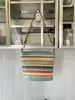 Bolso Tejido de Alta Gama con Rayas de Color Contrastante Transfronterizo de Gran Capacidad para un Solo Hombro, Bolso de Axila, Estilo Occidental Casual, Bolso Tipo Cubo, Bolso Cruzado