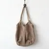 Bolsa de palha tecida para mulheres, grande capacidade, nova coleção primavera/verão 2026, design casual versátil, padrão vazado, bolsa de ombro, perfeita para férias na praia
