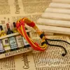 Joyería de moda europea y americana al por mayor joyería de cuero fábrica directa de pulseras de cuero pulsera de piel de vaca pulsera tejida