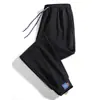 Pantalones Deportivos Casuales Nuevos para Hombre Primavera y Otoño Estilo Coreano Sueltos Acortados Pantalones de Chándal Casual con Canalé Marca de Tendencia para Hombre