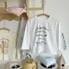 Liquidação Spot Bem-Estar Camiseta Infantil Menina Algodão Puro 2025 Outono Nova Chegada Bebê Menina Cor Doce Blocos de Cor Desenho Animado