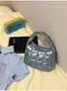 Bolso Acolchado de Moda para Mujer 2025 Nuevo Modelo Bolso de Hombro de Tela de Plumas Brillante Versión Coreana Bolso Versátil de Diseño de Nicho