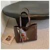 Bolsa grande retro de cuero encerado al por mayor transfronteriza para mujer, nueva moda, bolsa de mano de nicho, gran capacidad, para llevar debajo del brazo, de un solo hombro
