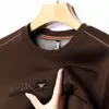 Suéter de manga larga para hombre 2023 Primavera y Otoño nuevo casual de negocios para hombre holgado de cuello redondo jersey top estampado ropa