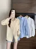 Camisa blanca protectora del sol con un diseño único, chaqueta de camisa de manga larga chic petite estilo francés