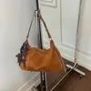 Bolsa de mão transfronteiriça estilo coreano nicho poá para mulheres 2026 bolsa quadrada pequena bolsa de ombro única bolsa transversal casual de grande capacidade
