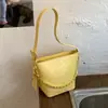 Bolso de cubo con cadena de rombos transfronterizo para mujer, nuevo bolso de mano versátil para el día a día 2026, bolso de hombro y cruzado para el trabajo.