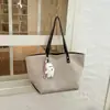 Bolsa Grande Capacidade Transfronteiriça Feminina 2026 Novo Estilo Fashionável Bolsa de Ombro Único Design de Nicho Textura Casual Bolsa Tote para o Dia a Dia