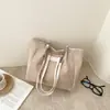 2026 Color Sólido Moda Nueva Tendencia Simple Popular Bolso Tote de Gran Capacidad para Mujer Textura Colgante Casual Bolso para el Trabajo