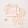 Roupas de bebê roupas infantis de outono calças compridas puro algodão classe A primavera e outono Novo pijama de bebê de 1 ano de idade ombro fivela roupa interior