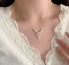 Collar de Perlas con Lazo Francés para Mujer Ropa de Playa con Faldas Accesorios Gargantilla Lujo Ligero Gama Alta Versátil Cadena para Clavícula