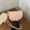 Bolsa pequena moderna estilo coreano para mulheres, novo modelo de verão 2026, bolsa de ombro simples de cor sólida, bolsa transversal para o dia a dia