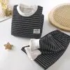 Traje de ropa interior de forro polar para niños otoño e invierno Nuevo engrosado cálido ropa de otoño pantalones largos pequeños y medianos para hombres y mujeres traje base para el hogar